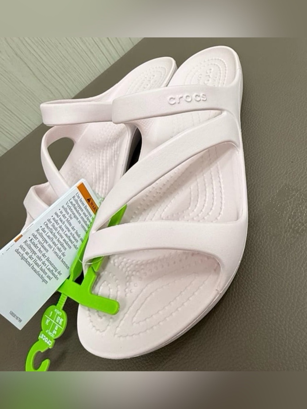 CROCS Women's size 8 Pale Pink Slip-On Sandals with Green Tag